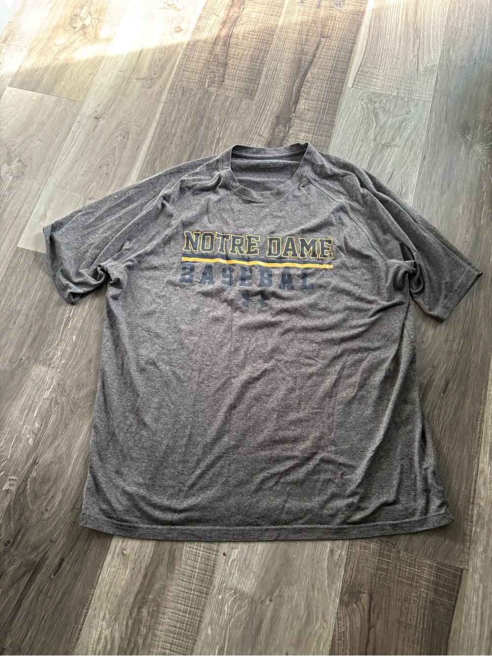 Under Armour Gray Notre Dame Baseball Tee with Gold Lettering